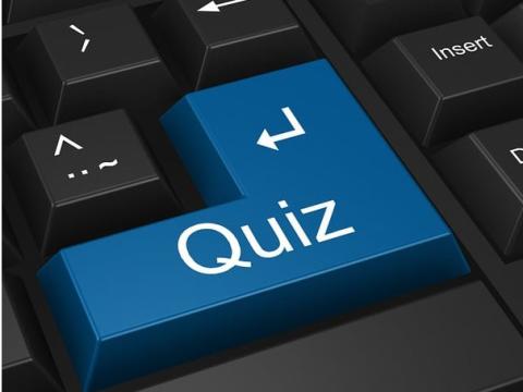 Gros pla d'une touche d'ordinateur sur laquelle est écrit le mot Quiz